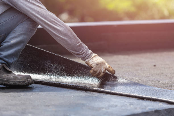 Professional Waterproofing technician working in Brentwood, NY